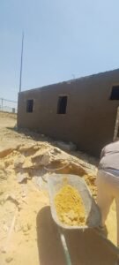 تنفيذ أعمال اللياسة الخارجية وتجهيز مواد التلييس للمبنى